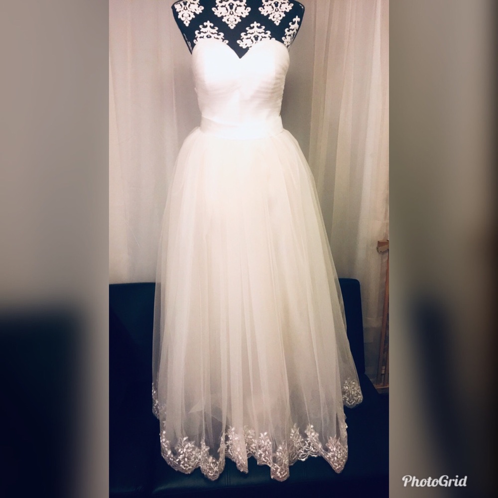 Custom made candlelight bridal gown